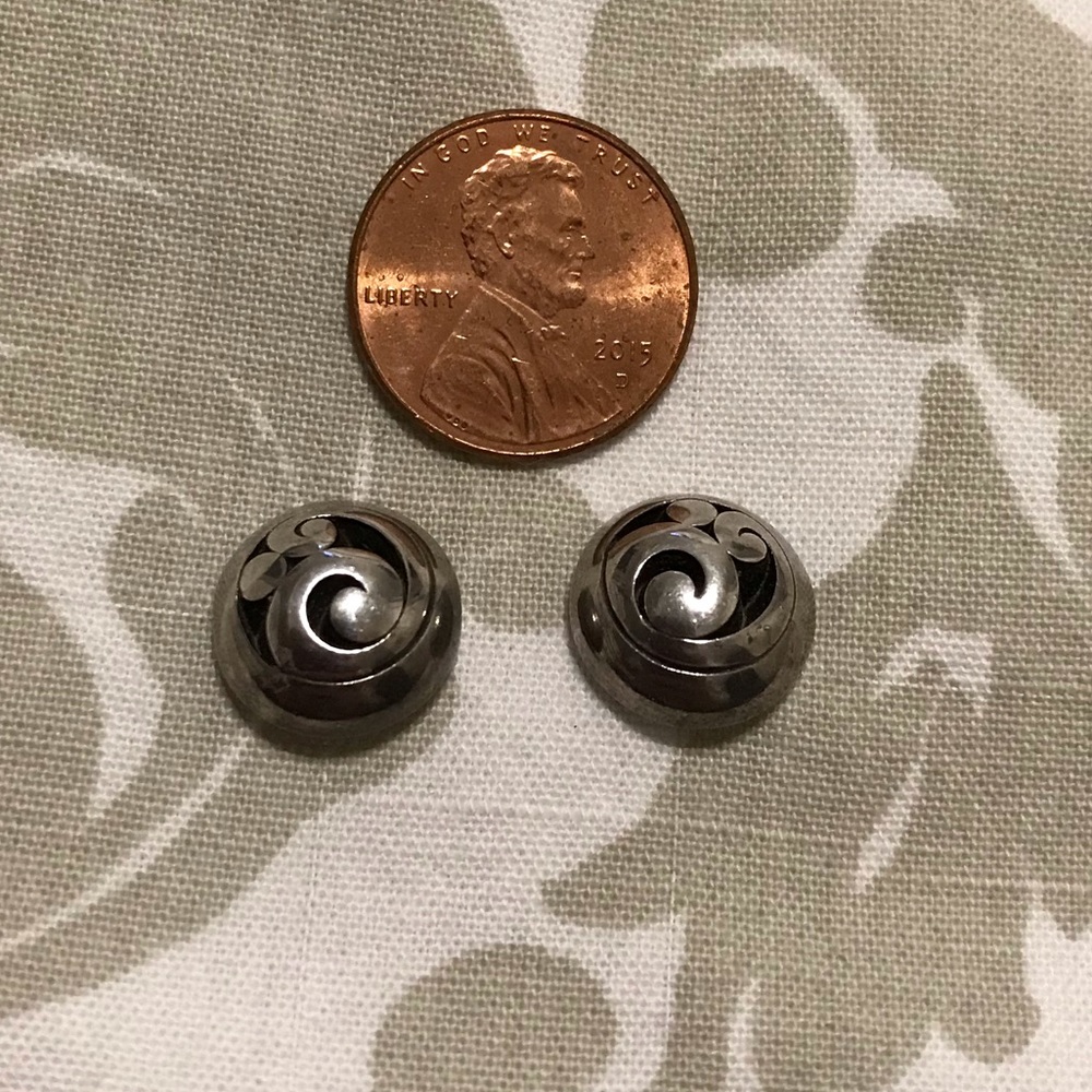 Beautiful silver button earrings.